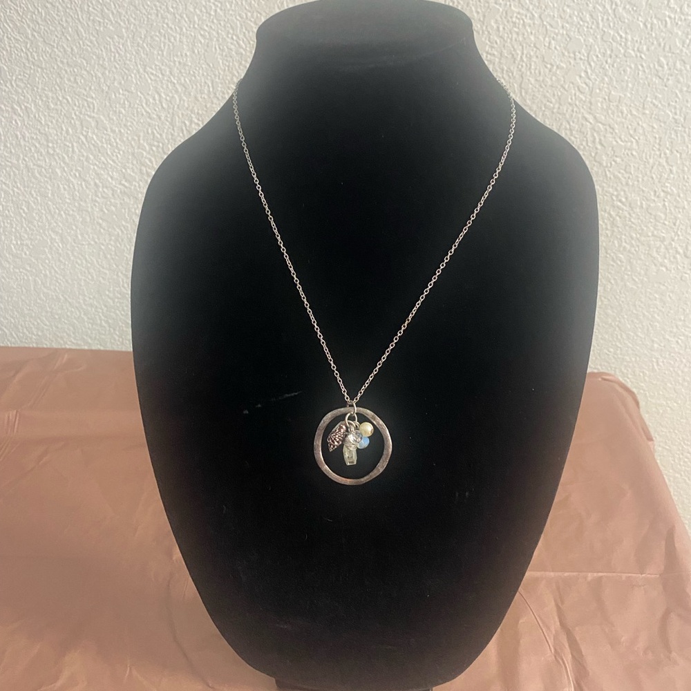 Elegant Silver Pendant Necklace with Blue Accents